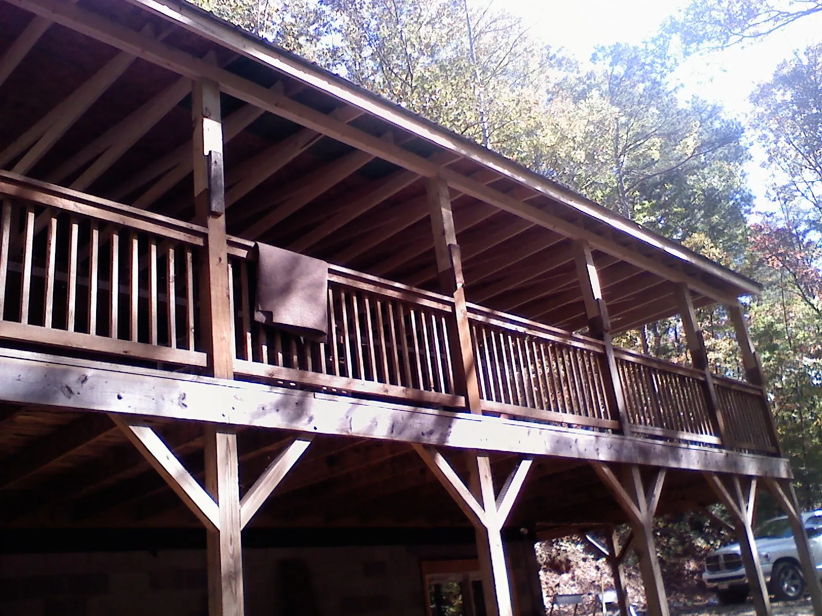 Timber framing under a new elevated porch and deck — Roof Leak Repair in Canyon Lake by Roofing Brothers